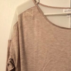 Sheer back blouse by Charming Charlie